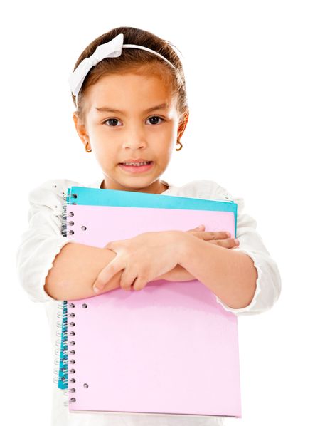 Girl going to school holding notebooks - isolated over a white background