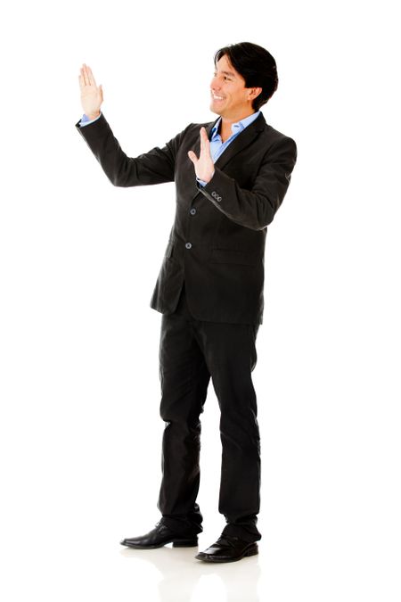 Businessman touching imaginary object with hands - isolated