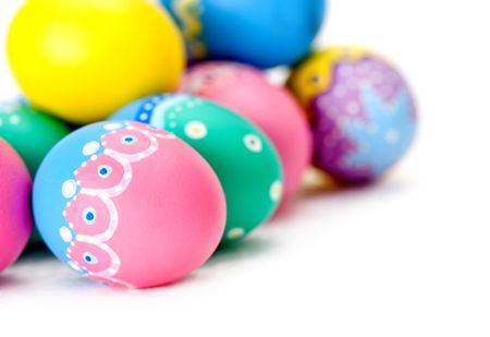 Hand painted Easter eggs in pastel colors - isolated over a white background