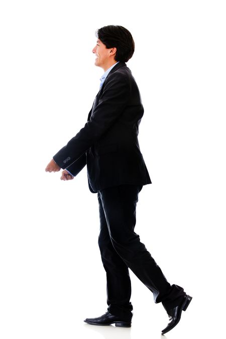 Businessman walking and carrying something - isolated over white