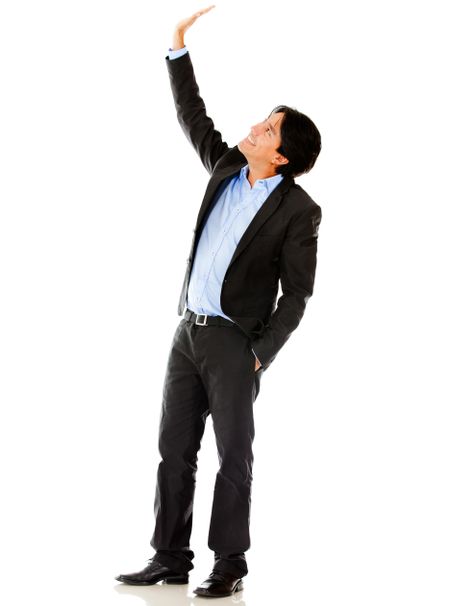 Businessman lifting one arm - isolated over a white background